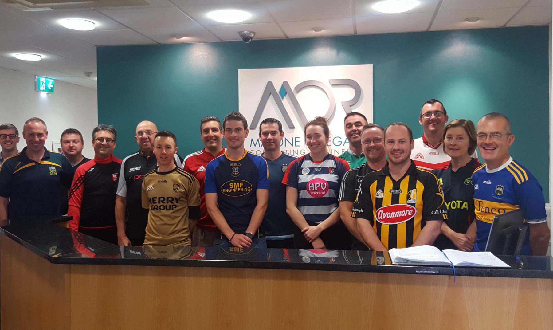 Malone O’Regan Team in jerseys - Social Responsibility